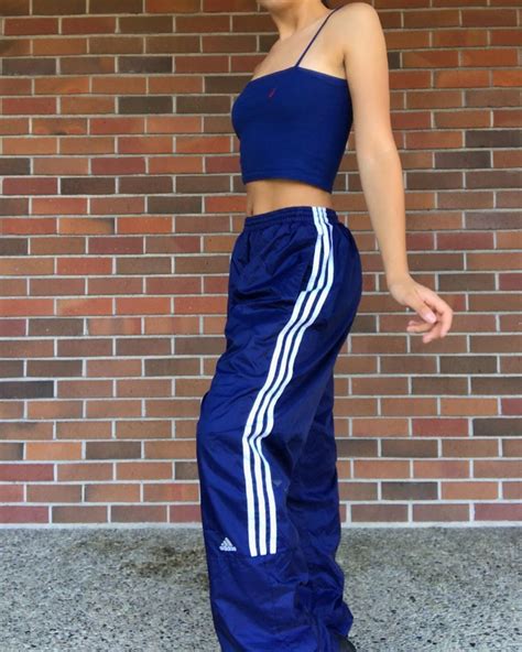 outfits con pants adidas|girls wearing adidas swishy pants.